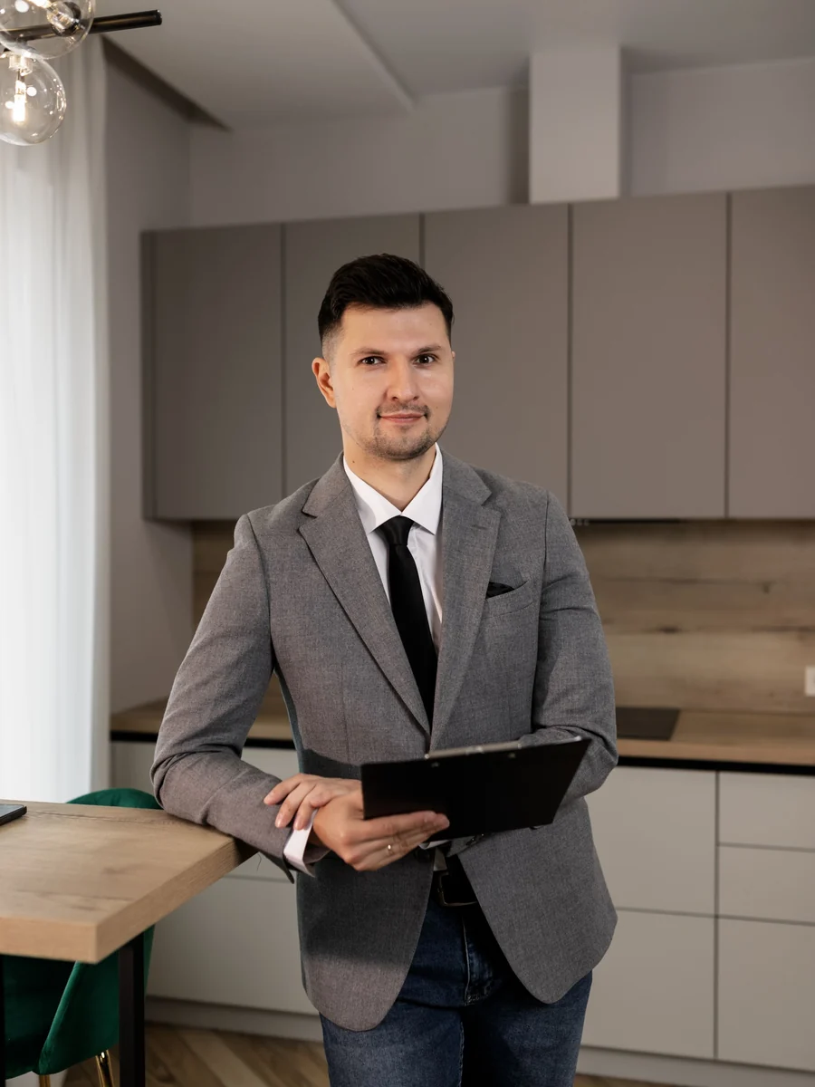 Homy negotiator with a clipboard in the George Town office