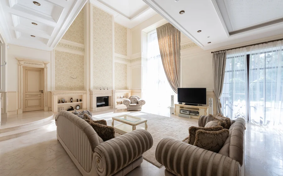 Living room with sofas facing the garden windows