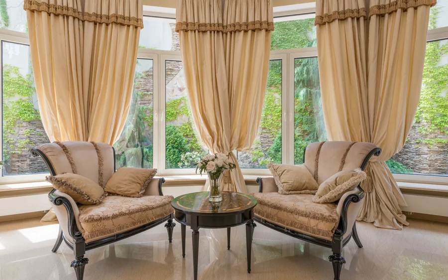 Reception room with a flower vase beside the armchair